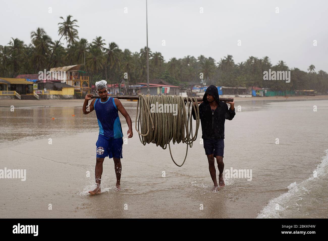 Fishing net beach goa india man hi-res stock photography and images - Alamy