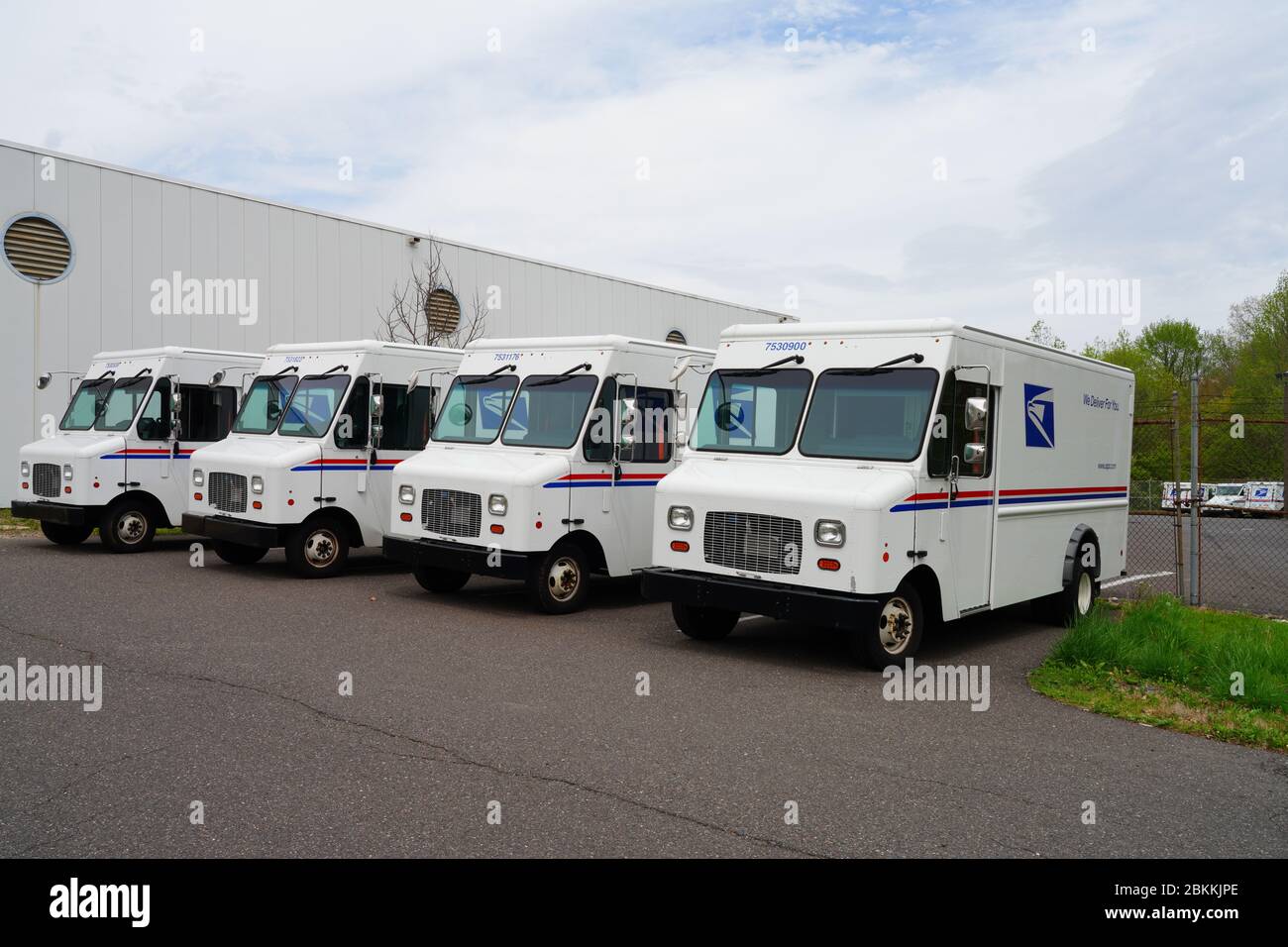 WEST WINDSOR, NJ 3 MAY 2020 View of mail delivery trucks from the