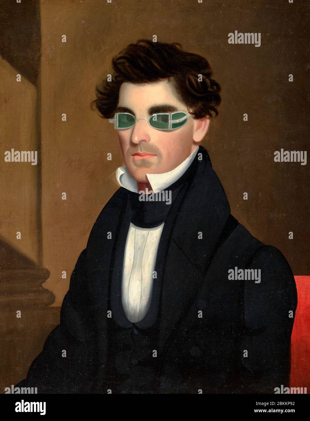 Nathaniel Olds by Jeptha Homer Wade, 1839.  The green-tinted spectacles worn by Olds were designed to protect the eyes from the intensity of Argand lamps, a type of indoor light used during the early 1800s. These lamps burned whale oil, and many people worried that its bright flames might damage eyesight. Stock Photo