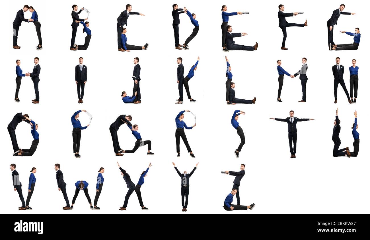 Group of people forming english alphabet at studio Stock Photo