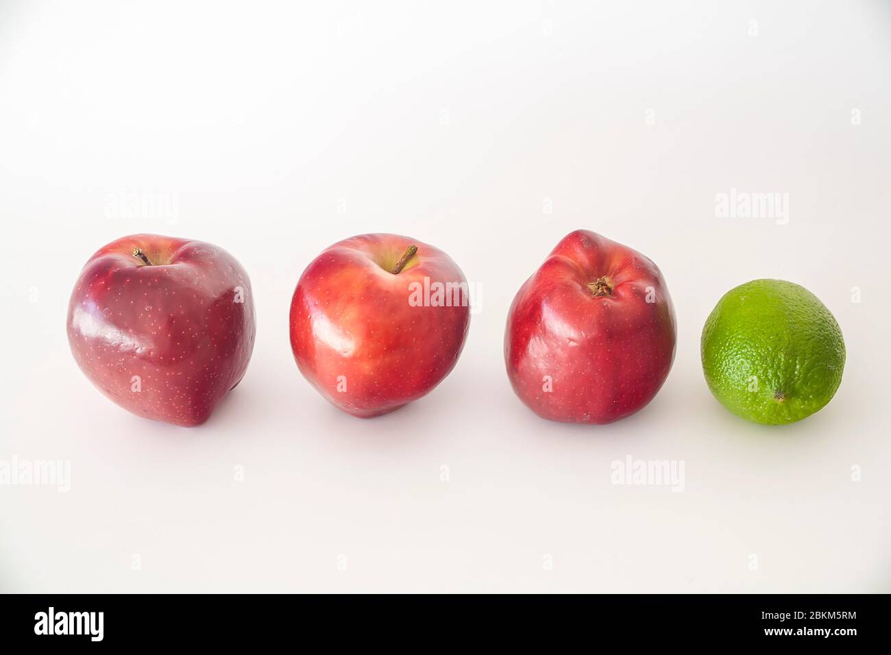 red apples and green lime Stock Photo