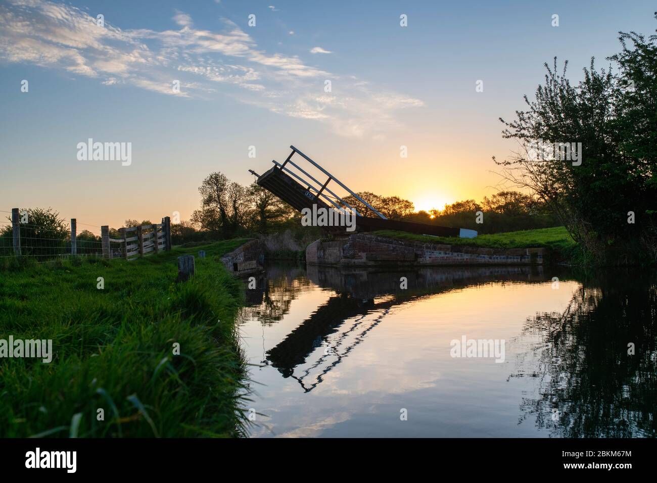 Draw bridge on the Oxford Canal at sunrise. Near Somerton, Oxfordshire, England Stock Photo