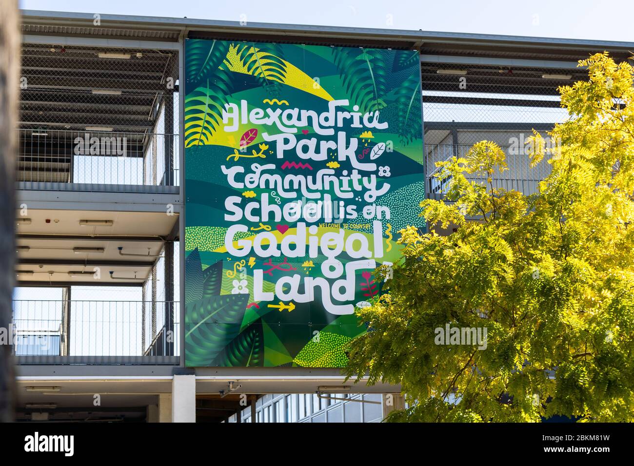 Alexandria Park School, Sydney.  Sign saying it is located on Aboriginal land. Stock Photo