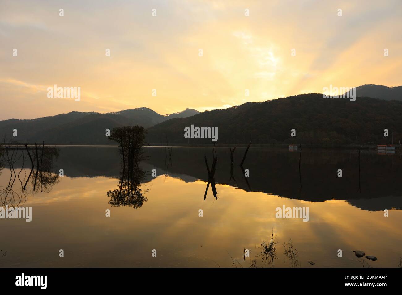 Reservoir morning beautiful sunrise reflection orange sky. Mungwang, Chungbuk, Korea Stock Photo