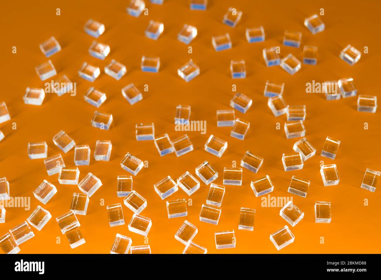 abstract plastic parallelepipedic shapes on a orange background Stock Photo
