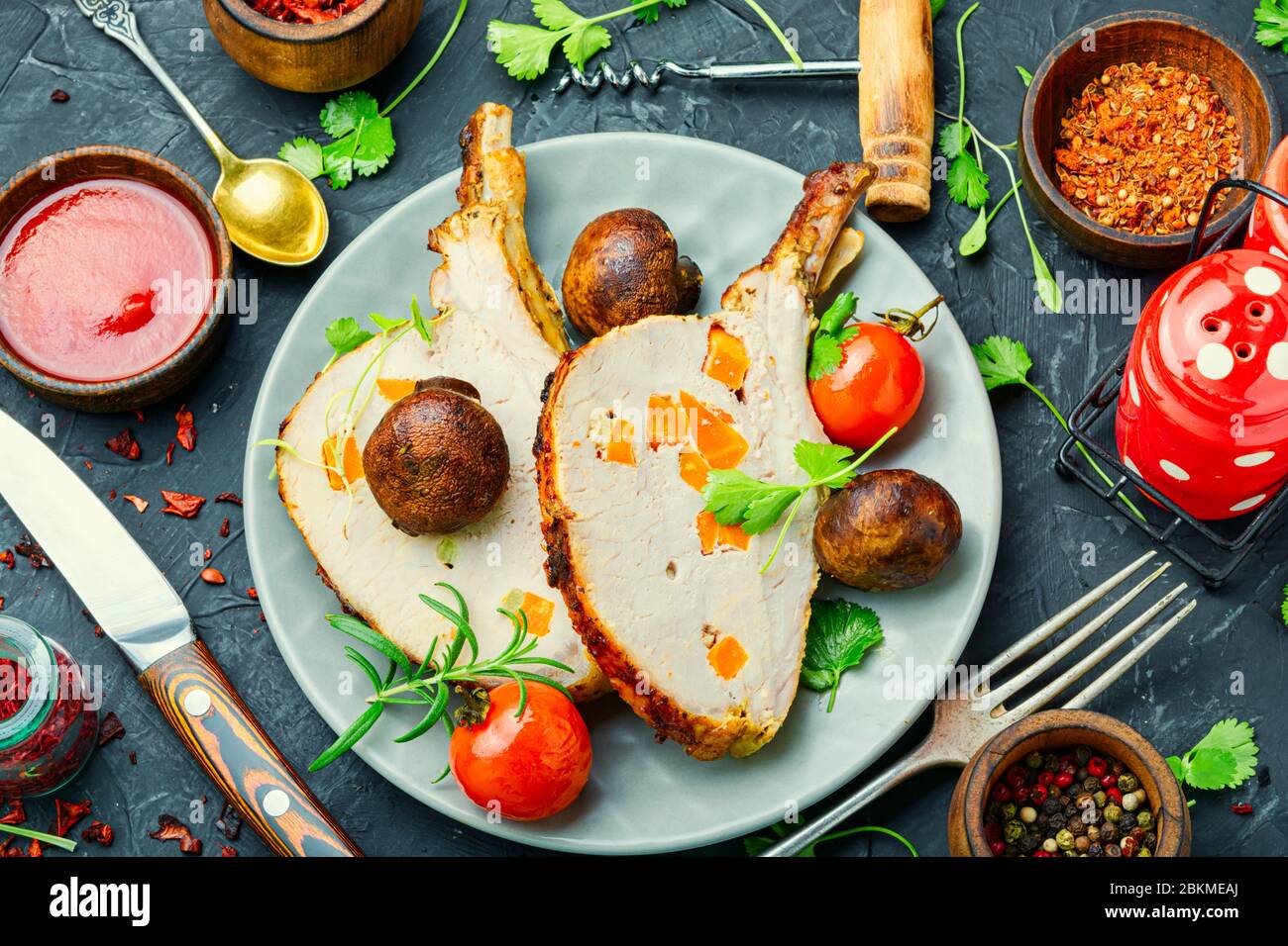 Pork loin or roasted rack of pork with vegetable.Grilled meat Stock