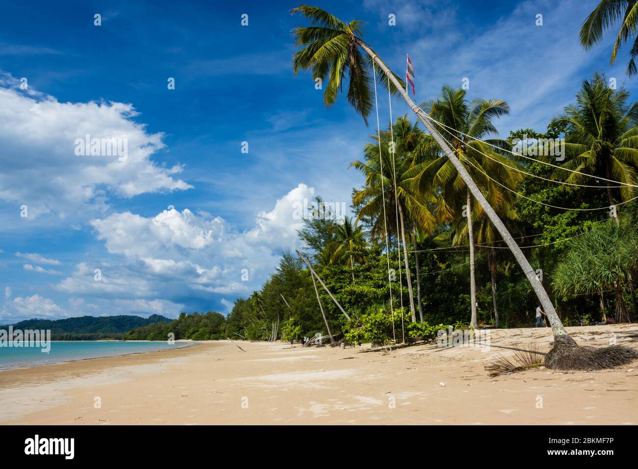 Completely deserted tropical beach in high season due to the Covid-19 Coronavirus lockdown and travel restrictions Stock Photo