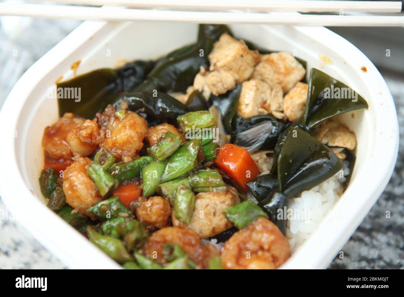 A nutritional balance chinese meal from a 7-11 store in Beijing. Stock Photo