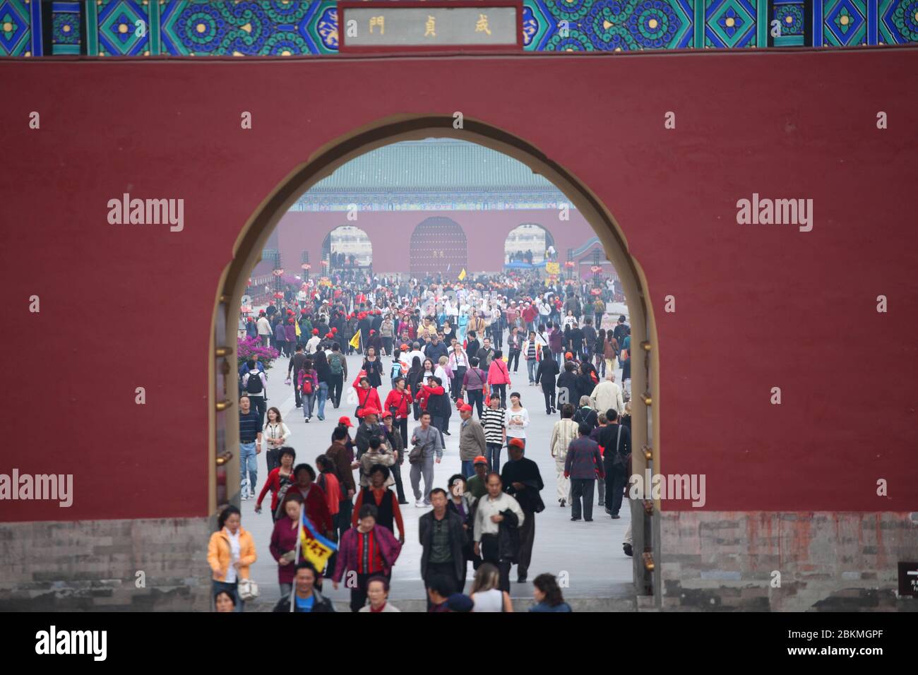 A huge crowds of tourists sightseeing at Temple of Heaven, the domestic travel market is big enough to generate local revenue. Beijing, China. Stock Photo