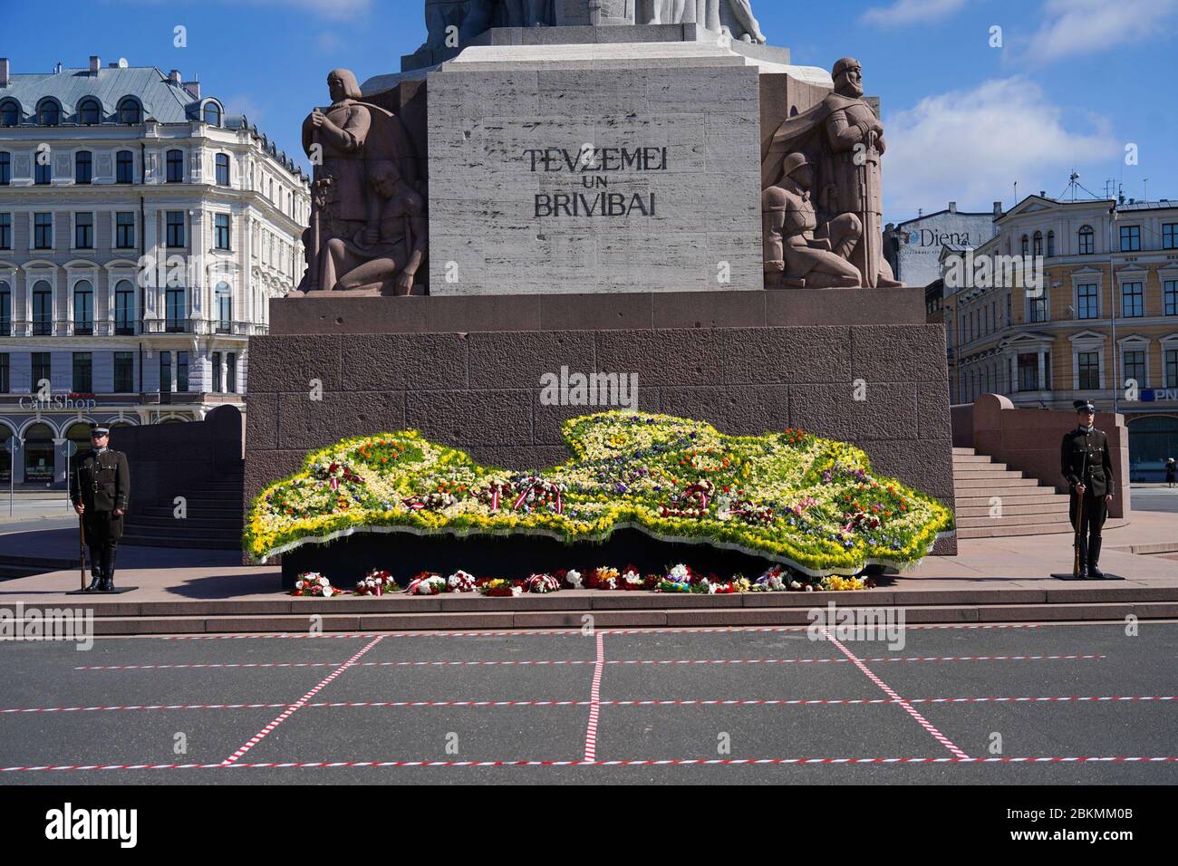 Riga. 4th May, 2020. A flower bed in shape of a Latvian map is set up in front of the Freedom Monument in Riga, Latvia, May 4, 2020, as the country marks the 30th anniversary of its declaration of independence. May 4 is celebrated by Latvians to mark the day the country declared independence from the former Soviet Union in 1990. Due to the COVID-19 pandemic, national-wide celebrations this year mostly took place at home as all annual events were cancelled. Credit: Janis Laizans/Xinhua/Alamy Live News Stock Photo