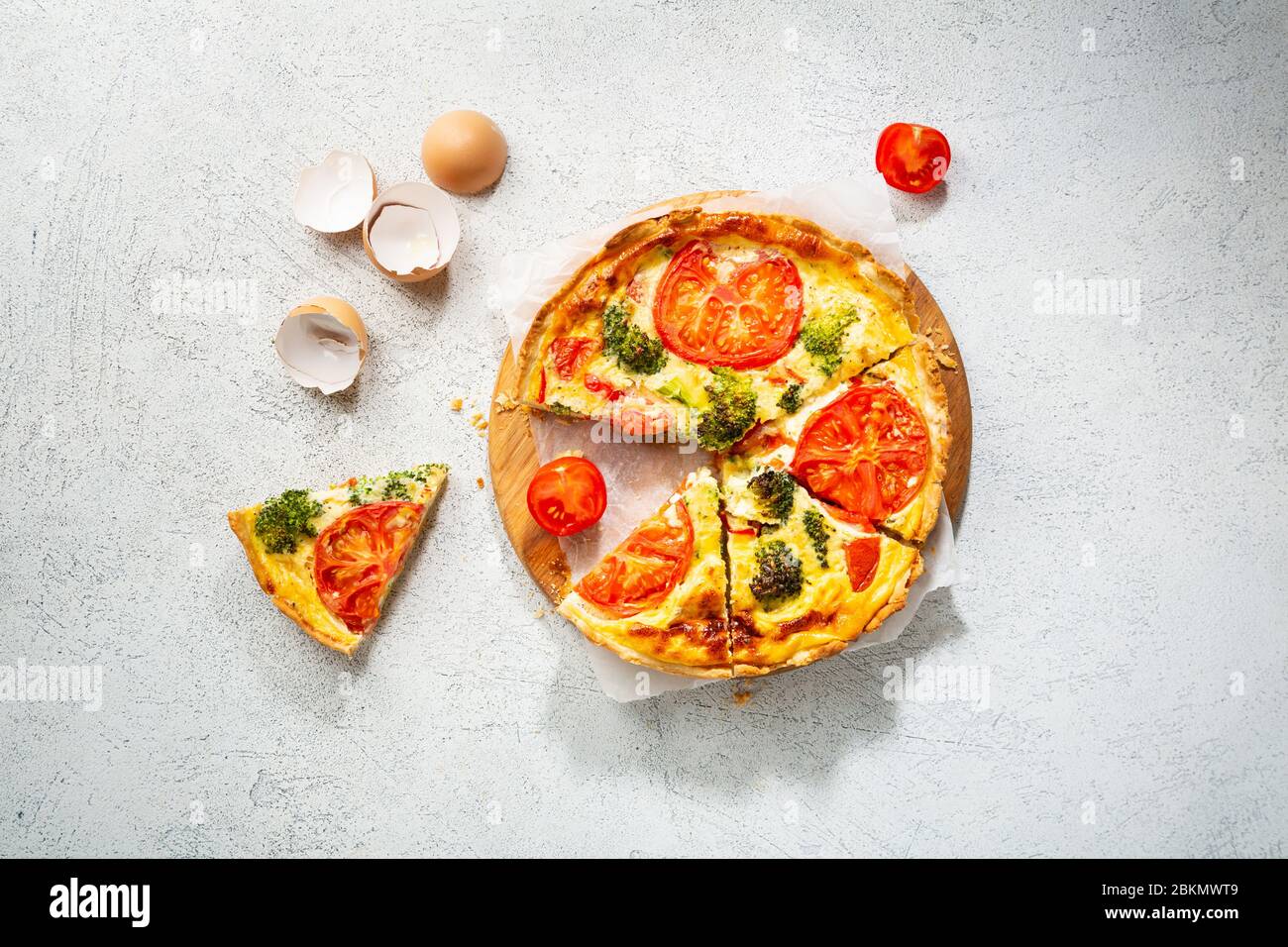 Overhead view of Quiche lorraine with broccoli and cheese Stock Photo
