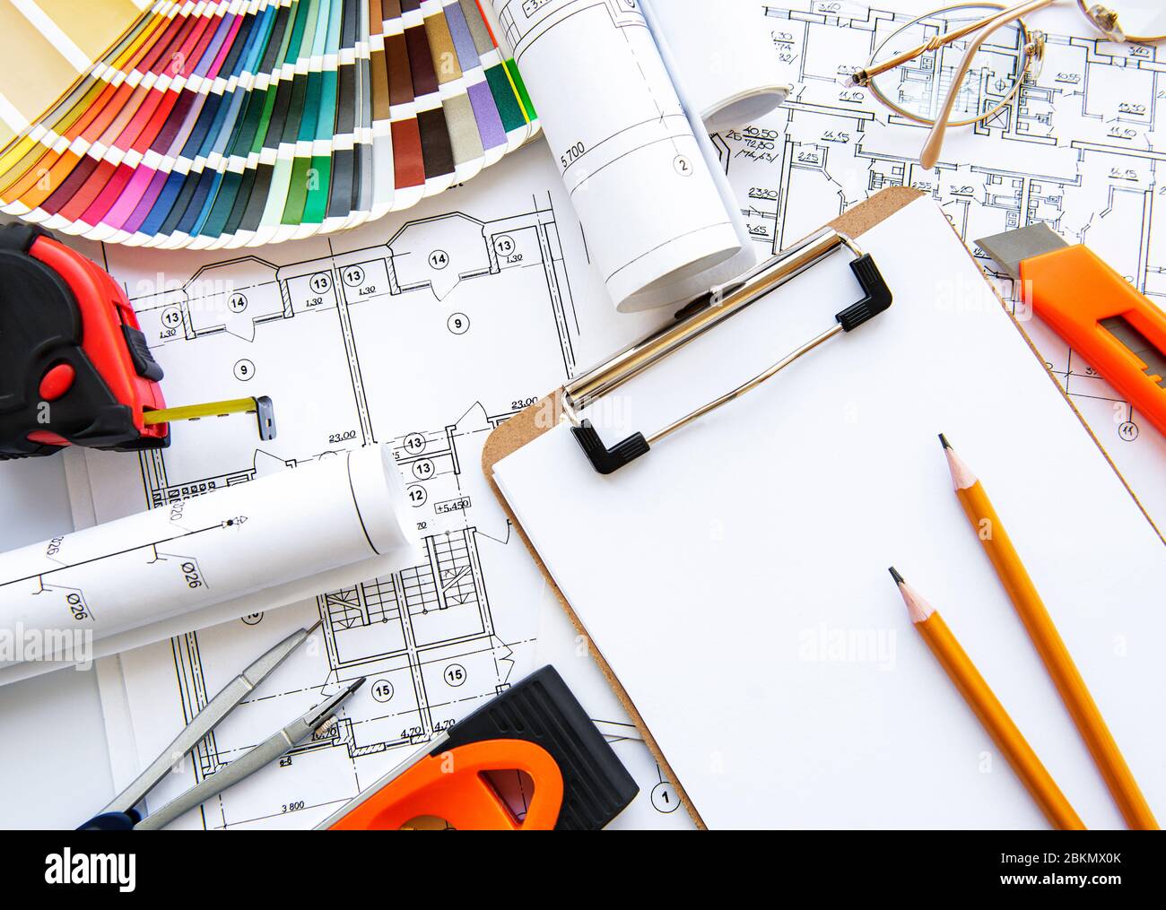 Architect workplace top view. Architectural project, blueprints