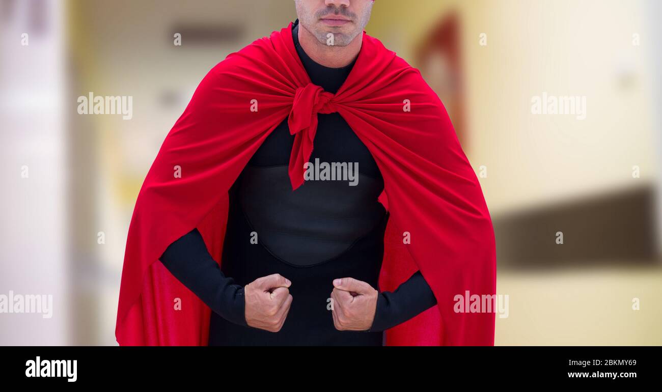 Digital illustration of a man wearing a cape flexing his muscles over a hospital hallway Stock Photo