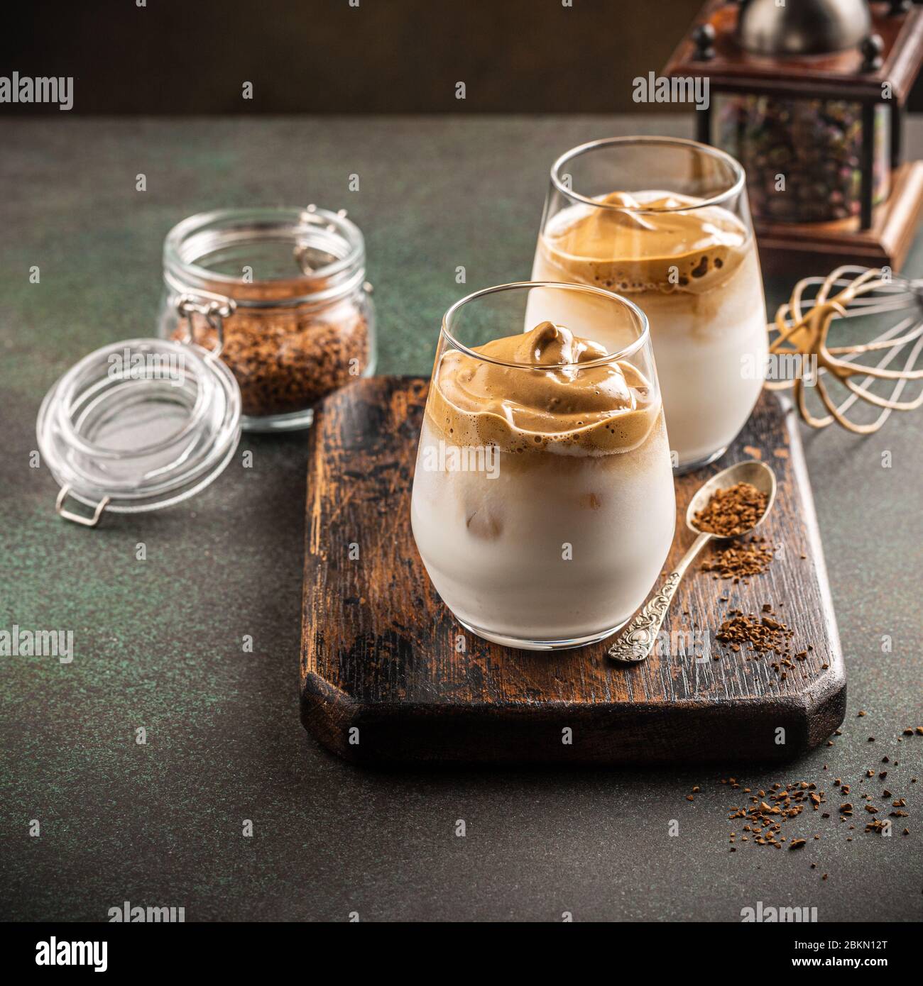 Dalgona coffee in glass cup Stock Photo