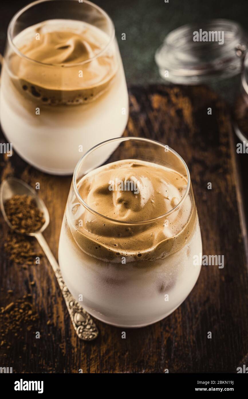 Dalgona coffee in glass cup Stock Photo