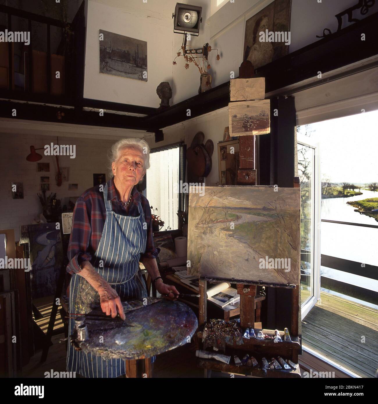 Margaret Thomas artist (1916-2016) in her studio in a watermill near Bungay Suffolk UK 2003 Stock Photo