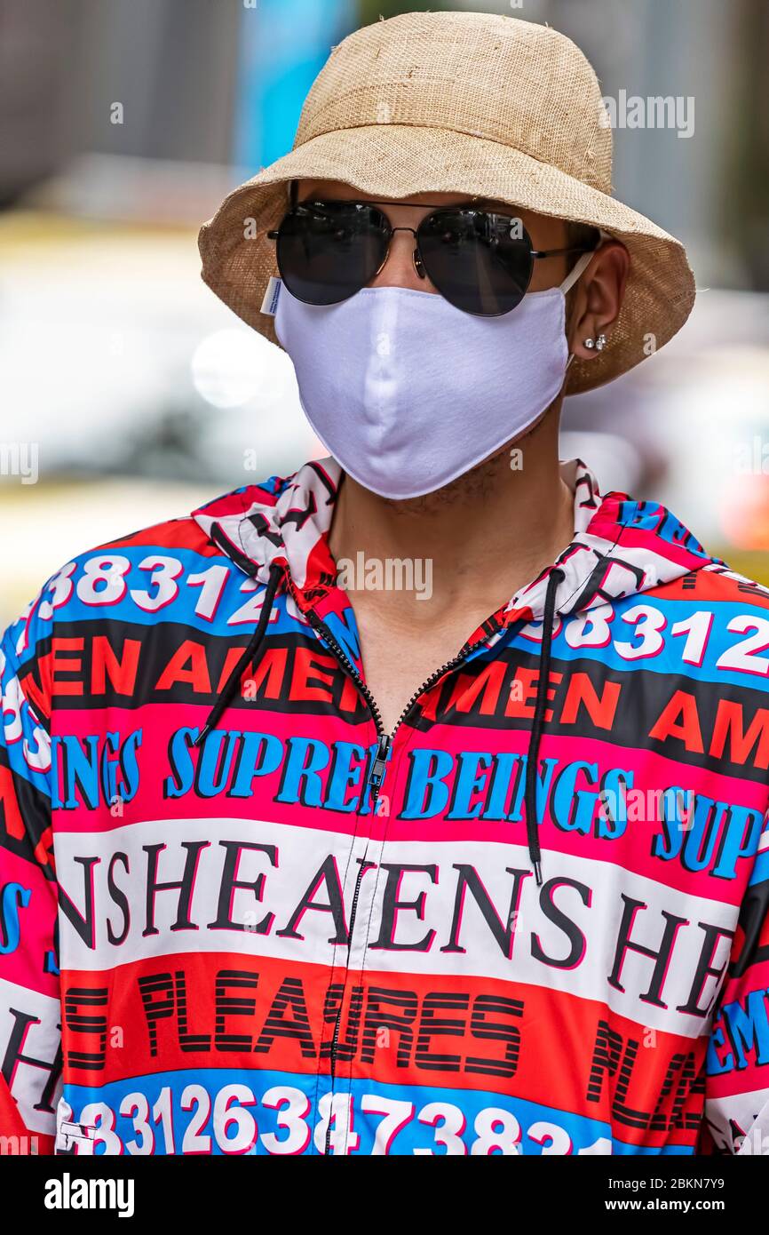 Wearing shorts sunglasses hires stock photography and images Alamy