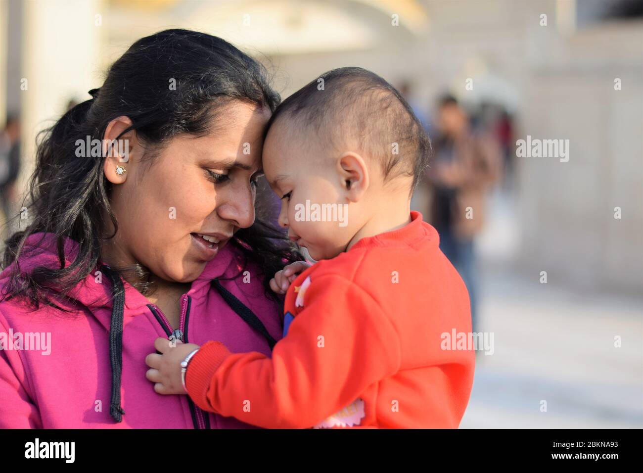 close up shot of mother with her little daughter facing each other Stock Photo