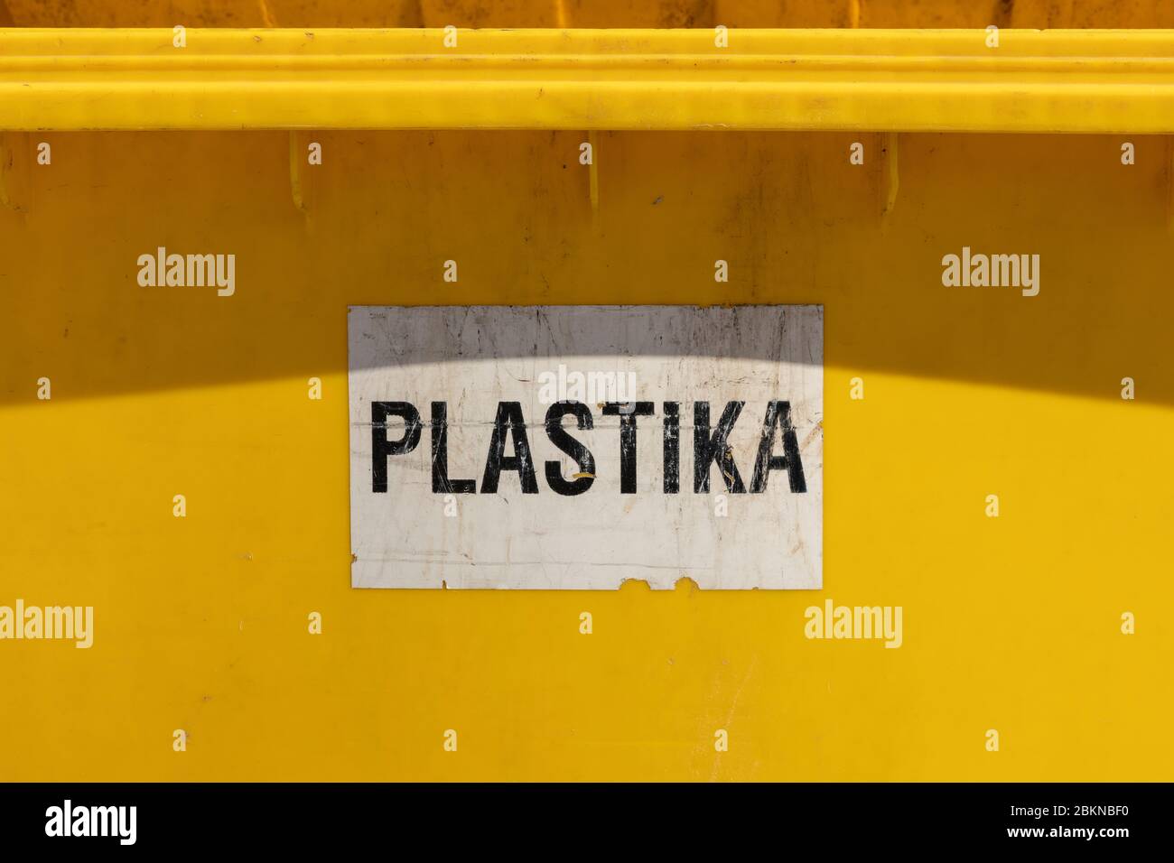 A big yellow container box for plastic standing outside in Dubrovnik,  Dalmatia, Croatia Europe. A way to collect plastic and recycle or reuse it,  circ Stock Photo - Alamy