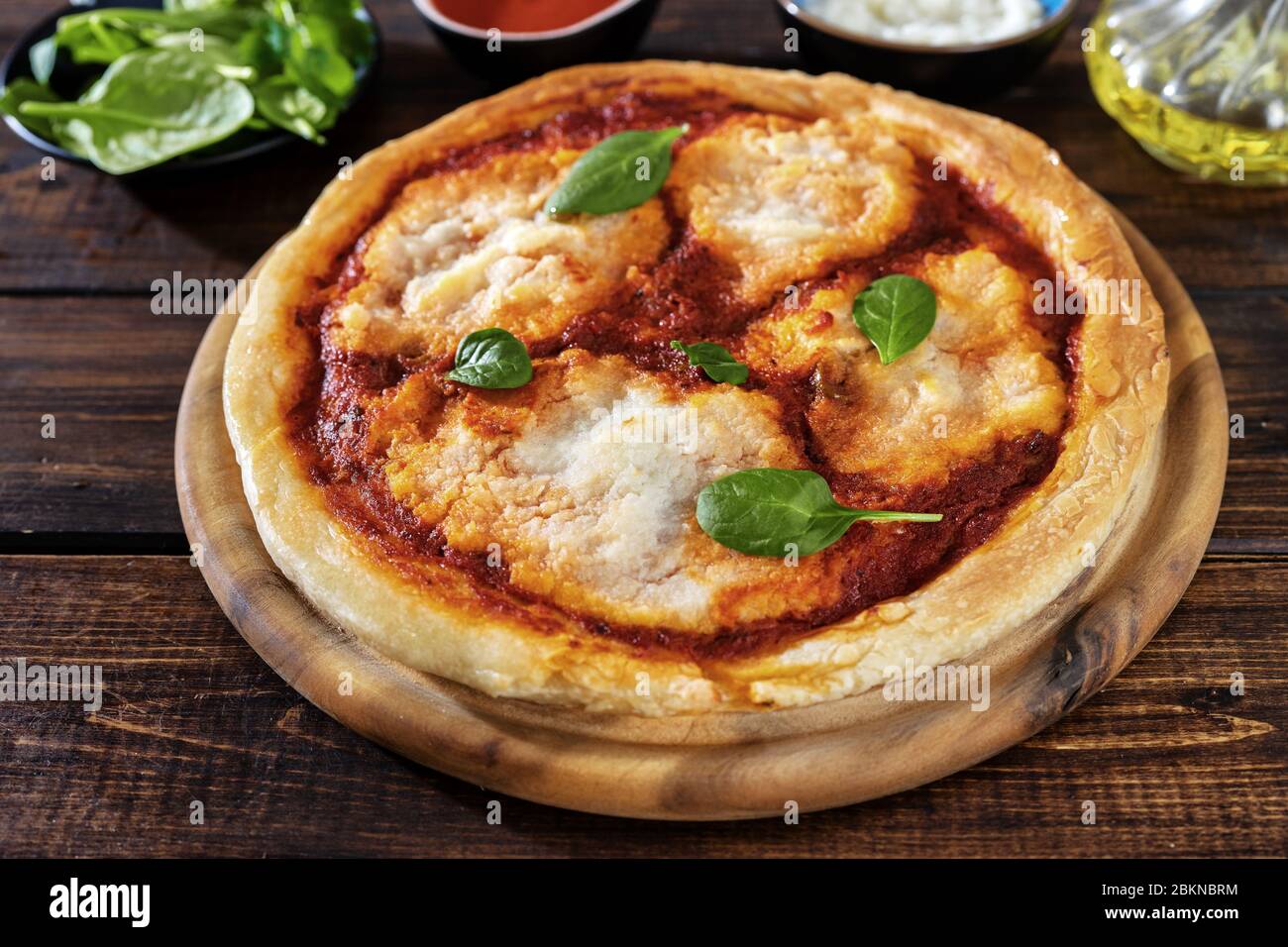 Close up of vegan pizza margherita with cauliflower creamy sauce Stock Photo
