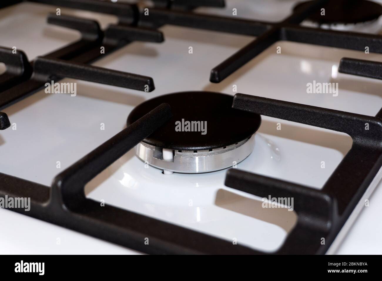 gas ring on the stove with cast iron grate Stock Photo Alamy
