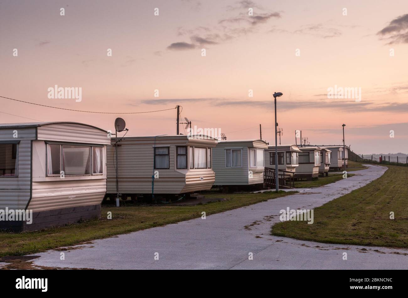 Garryvoe, Cork, Ireland. 05th May, 2020. Early morning light over a deserted mobile homes in Garryvoe, Co. Cork, Ireland. Due to present Government Covid-19 restrictions all caravan parks are closed until further notice.  - Credit; David Creedon / Alamy Live News Stock Photo