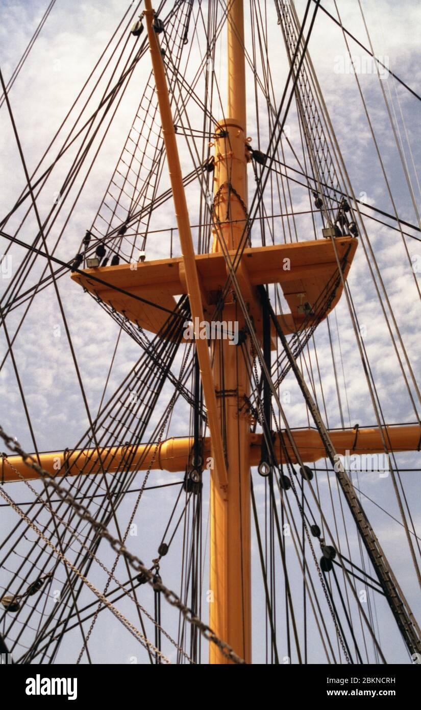 H.M.S. Warrior, Portsmouth Naval Base, Hampshire, England, UK: view from the starboard quarter showing fighting top, mast and rigging Stock Photo