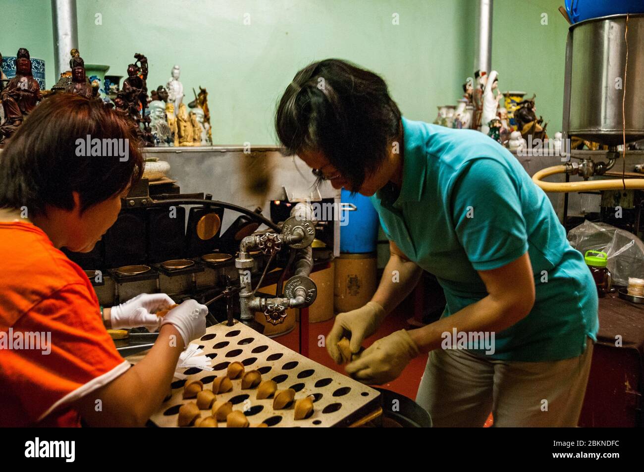 Making fortune cookies at the Golden Gate Fortune Cookie Factory, Ross