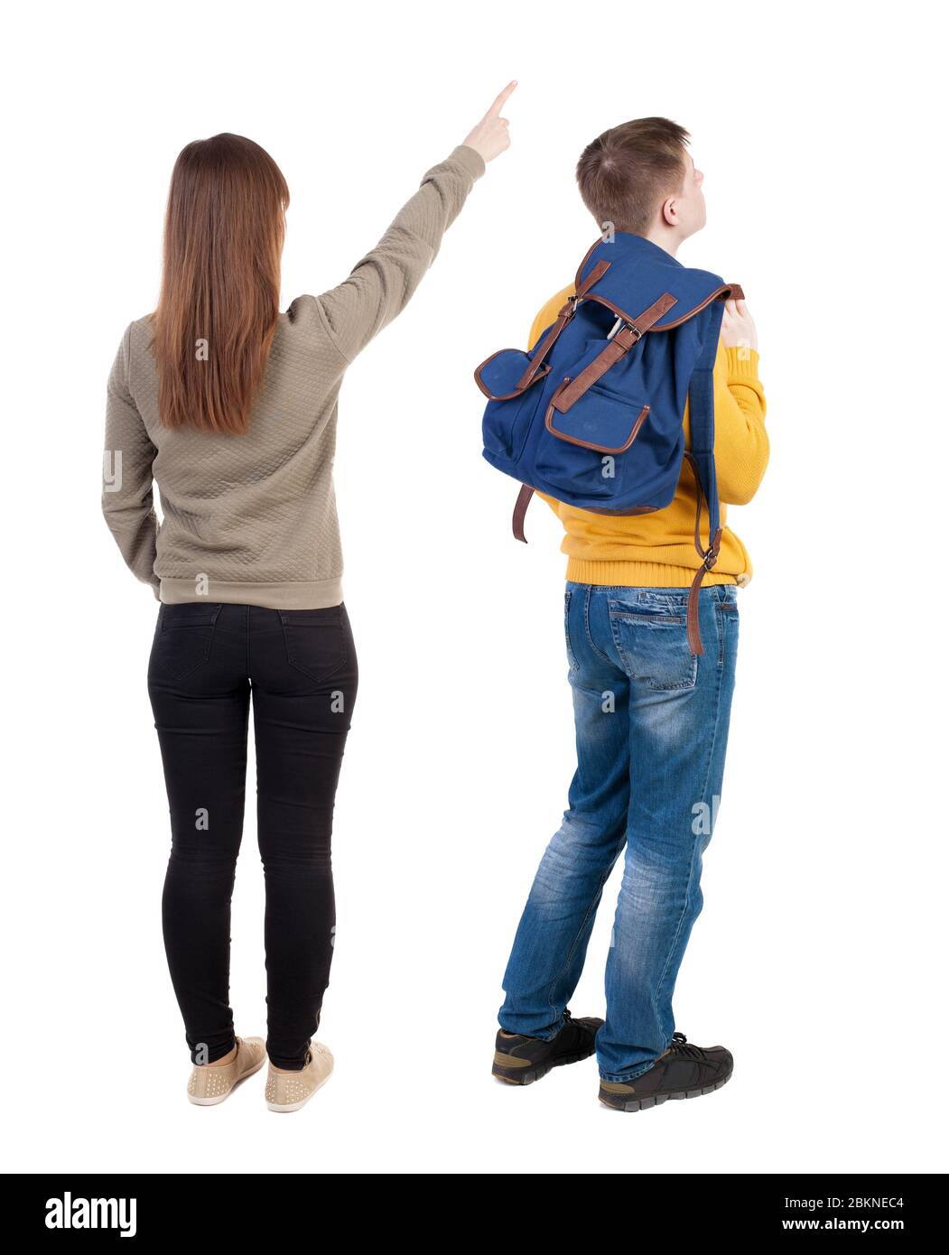 Back view of couple in sweater pointing. Rear view people collection ...