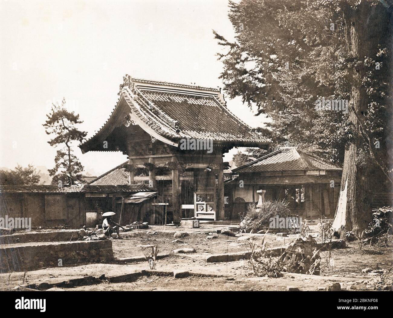 [ 1860s Japan - Burnt down American Legation in Tokyo ] —   Burnt down American Legation at Zenpukuji (善福寺) in Azabu, Tokyo.  In 1859 (Ansei 6), the Buddhist temple became the home of the first American legation in Edo. On May 24, 1863 (Bunkyu 3), several temple buildings were burned down by anti-Western samurai of the Mito Han.  This prompted the US Minister to Japan, Robert Hewson Pruyn (1815–1882), successor of US Consul Townsend Harris (1804–1878), to move to Yokohama.  19th century vintage albumen photograph. Stock Photo