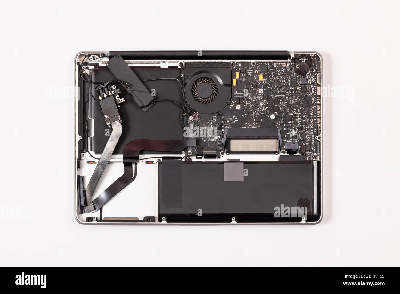 Unscrewed laptop flat lay. Computer repair or taking out the raw