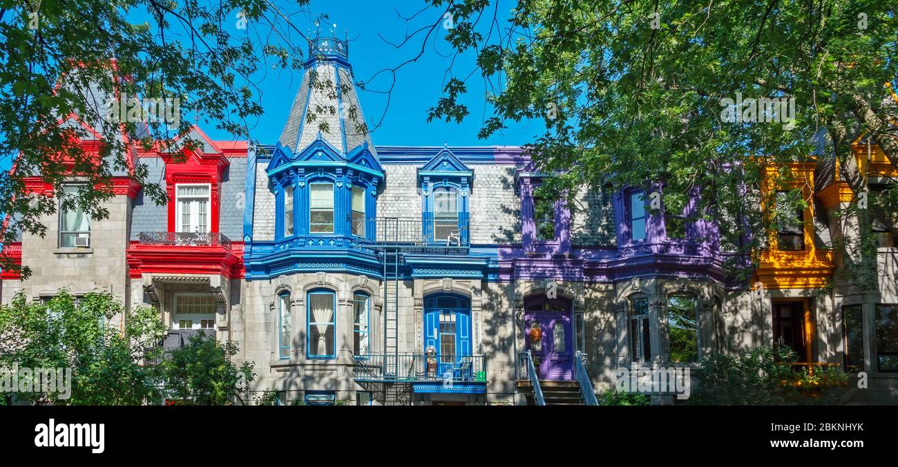 Pannorama of colorful Victorian houses in Le plateau Mont Royal borough in Montreal, Quebec Stock Photo