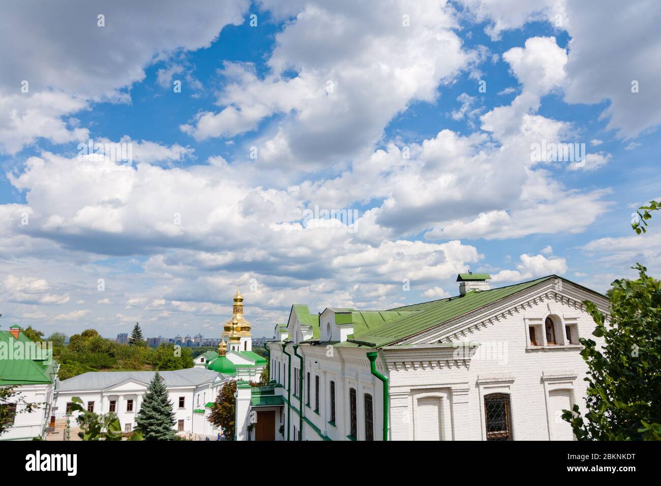 monastery with golden domes against the sky with clouds Stock Photo - Alamy