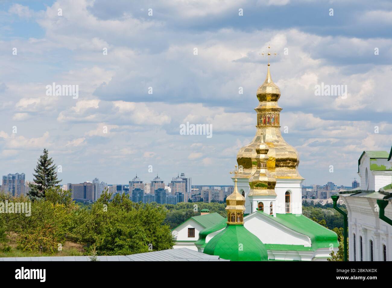 church with golden domes against the sky with clouds Stock Photo - Alamy
