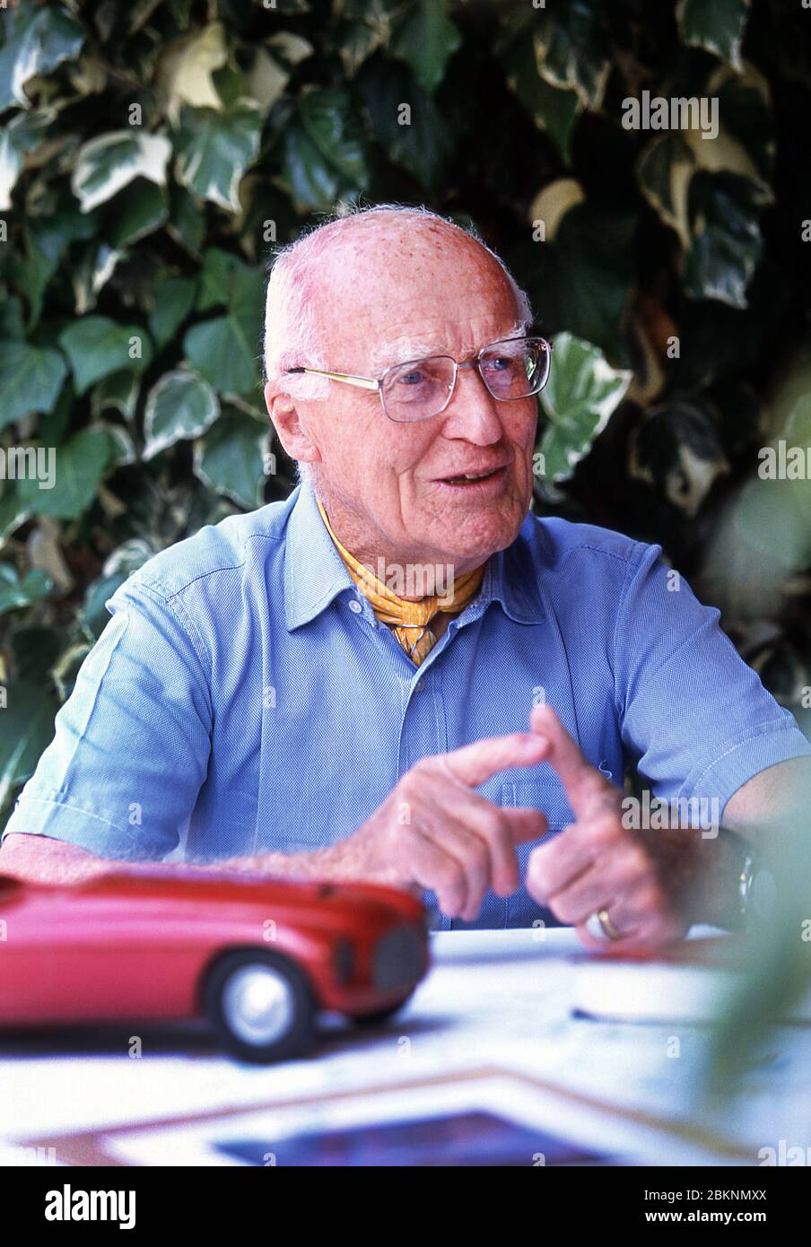 Carlo Anderioni  (1916- 2003) of Carrozzeria Touring with a 1948 model of the Ferrari 166 MM Barchetta at his home in Como Italy 2002 Stock Photo
