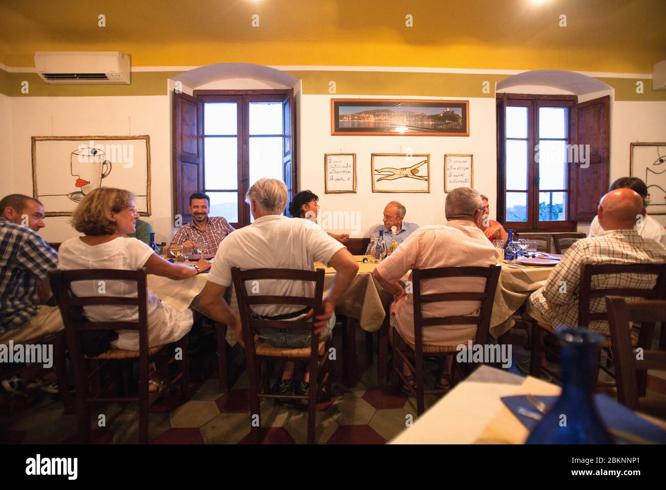 Italy Liguria Lerici - Friends Dining in Osteria L«Orto di Amneste Restaurant Stock Photo