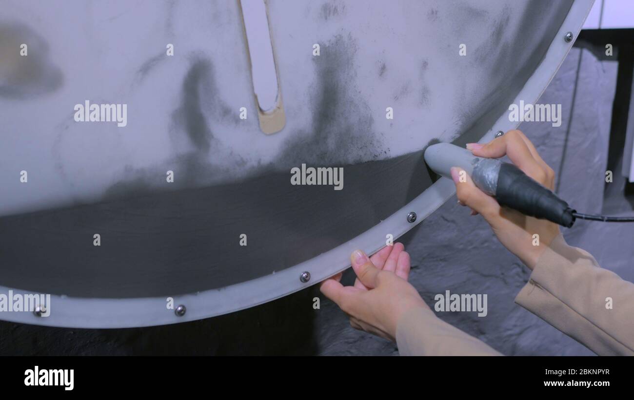 Interactive exposition in science museum woman with stick