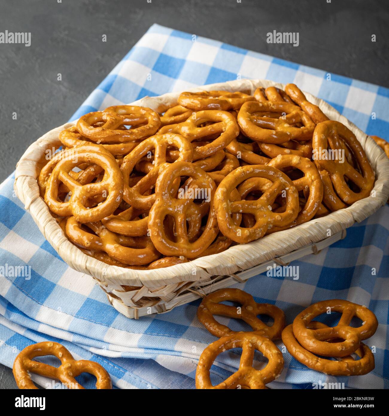 Salted Hard Pretzels on bllue napkin Stock Photo Alamy