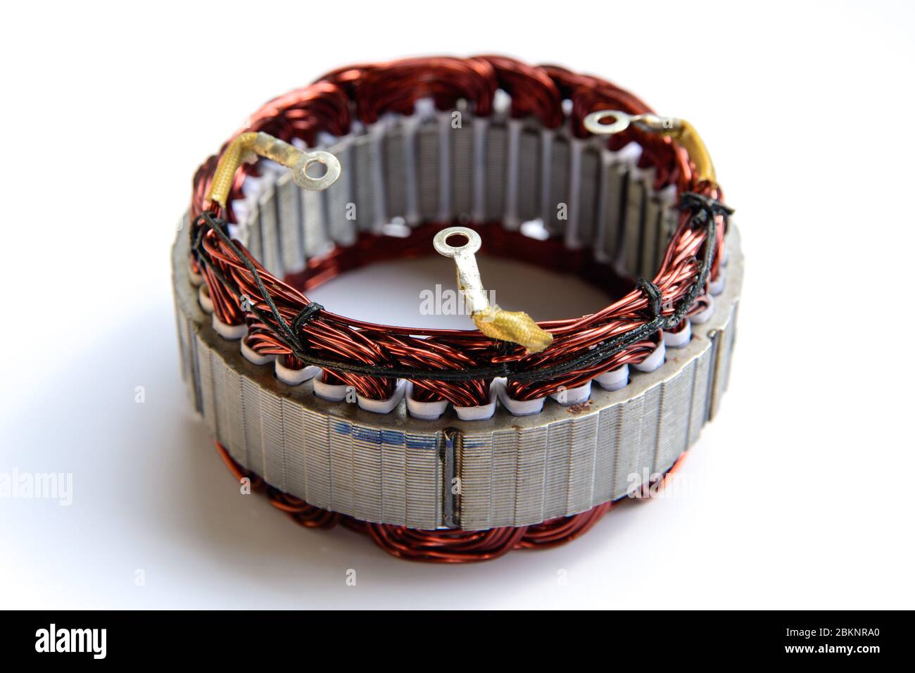 new car alternator stator on a white background Stock Photo Alamy