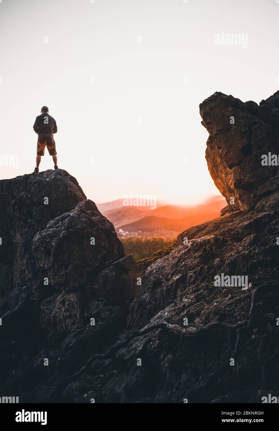 Standing on top of a mountain sunset hi-res stock photography and ...