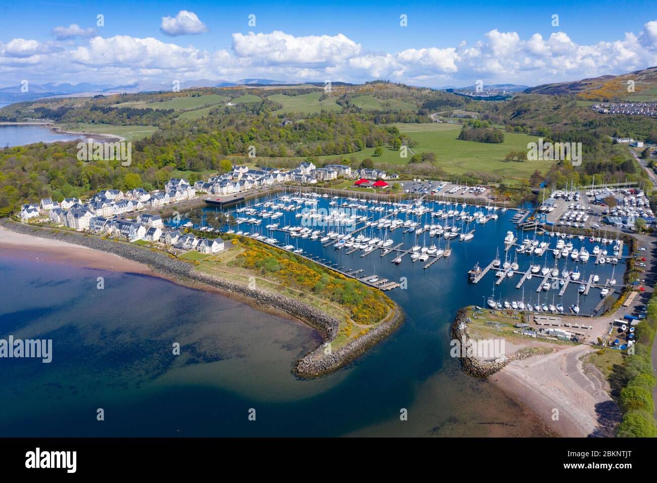 Aerial view of yacht marina and luxury housing development at Kip
