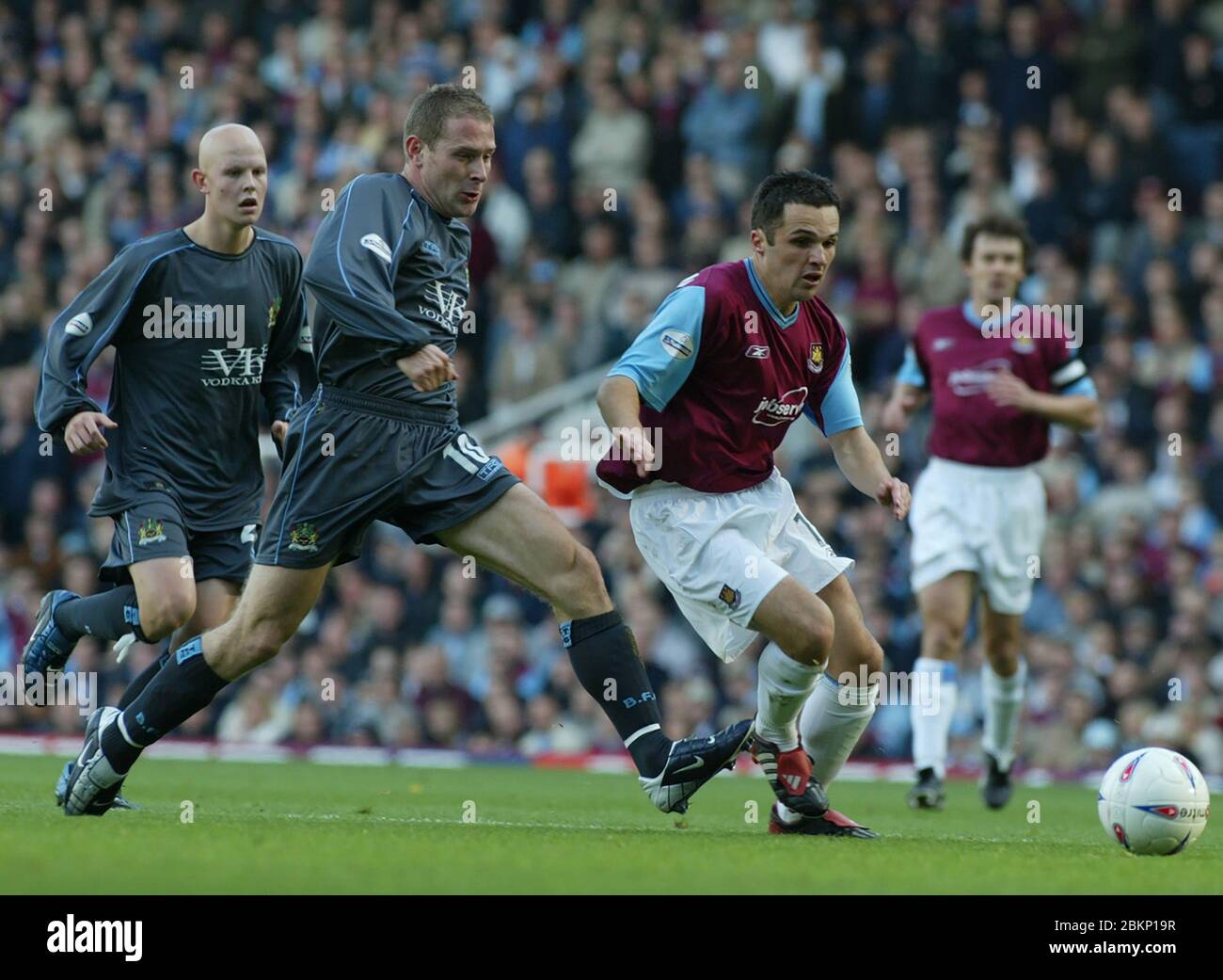 LONDON, United Kingdom, OCTOBER18: Matthew Etherington of West Ham United under pressure from Ian Moore of Burnley during Nationwide 1 between West Ha Stock Photo