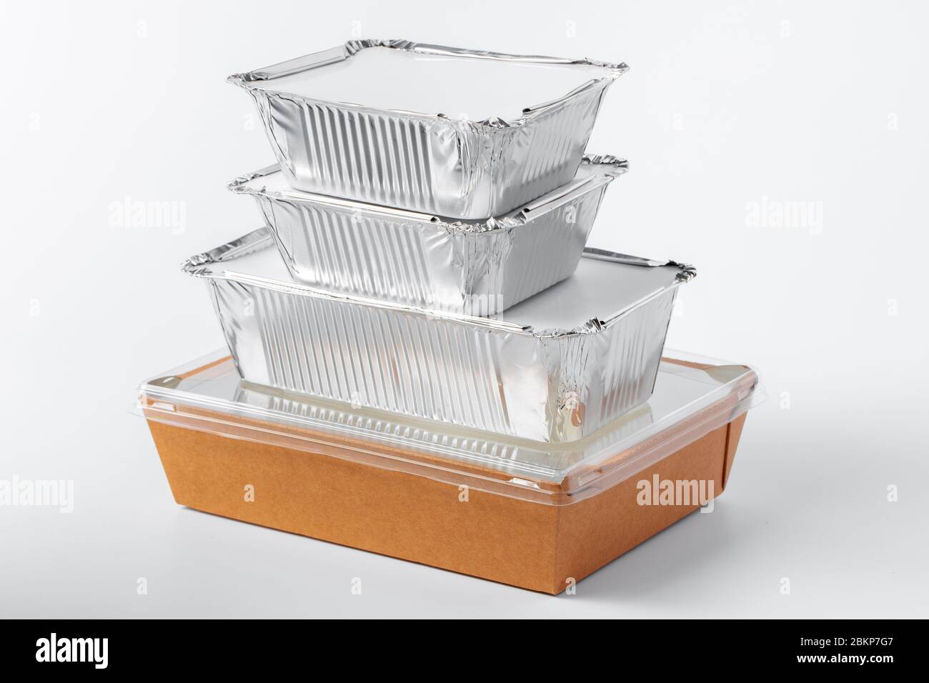 Assortment of food delivery containers on white background Stock Photo