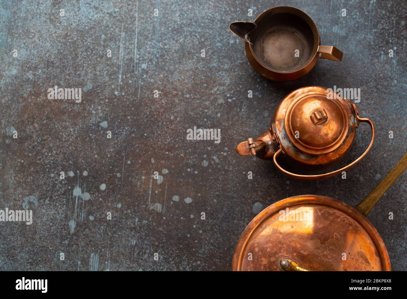 Set of old vintage copper empty tableware Stock Photo Alamy