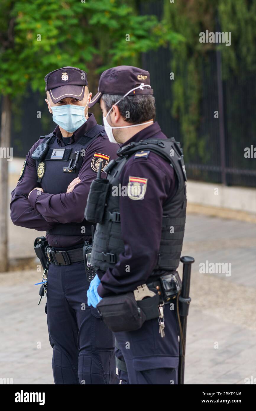 Spanish police with protective masks due to Coronavirus. Stock Photo