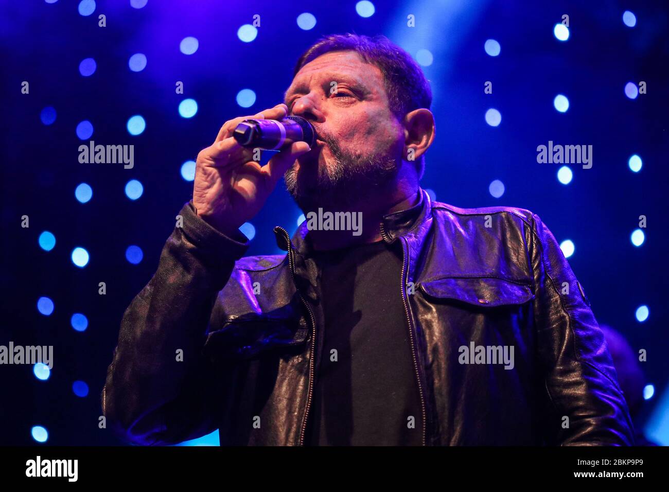 Singer Shaun Ryder of The Happy Mondays, as the band performs live at