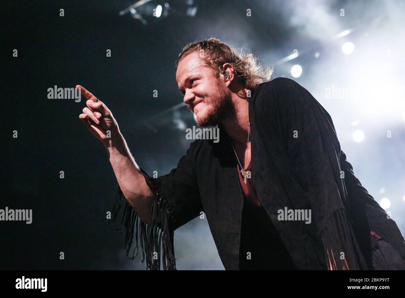Singer Dan Reynolds, of Imagine Dragons as the band performs live at the First Direct Arena in Leeds, West Yorkshire, UK to promote their album, Smoke Stock Photo