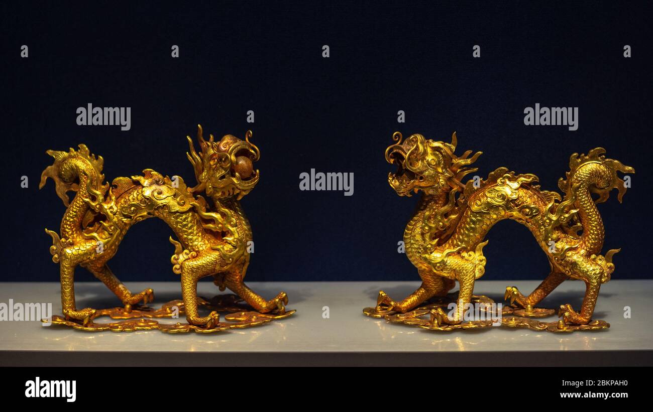 Beijing / China - February 20, 2016: Pair of golden dragons, symbols of imperial power, exhibited in National Museum of China in Beijing Stock Photo