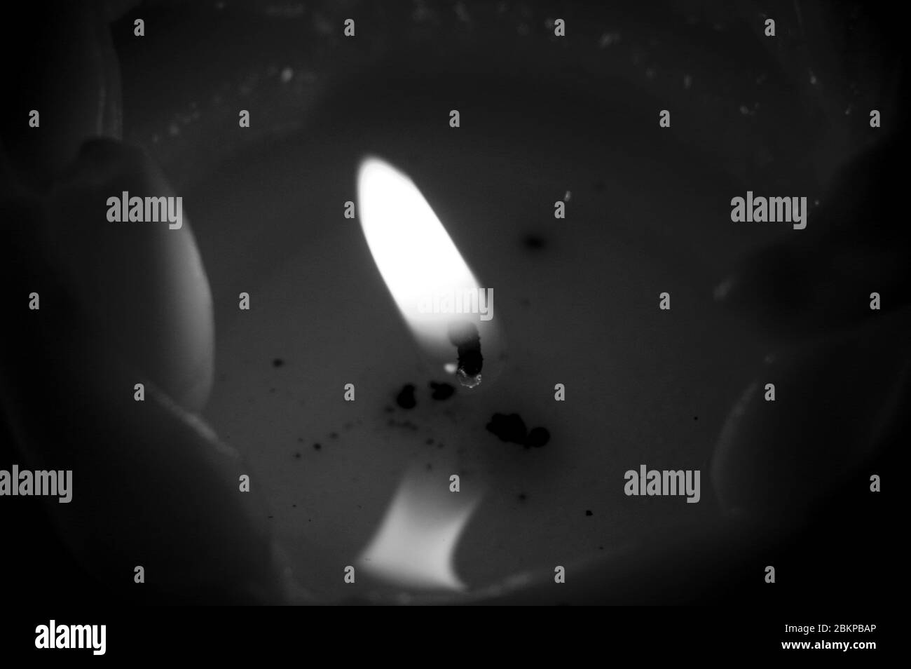 One candle flame at night closeup view Stock Photo Alamy