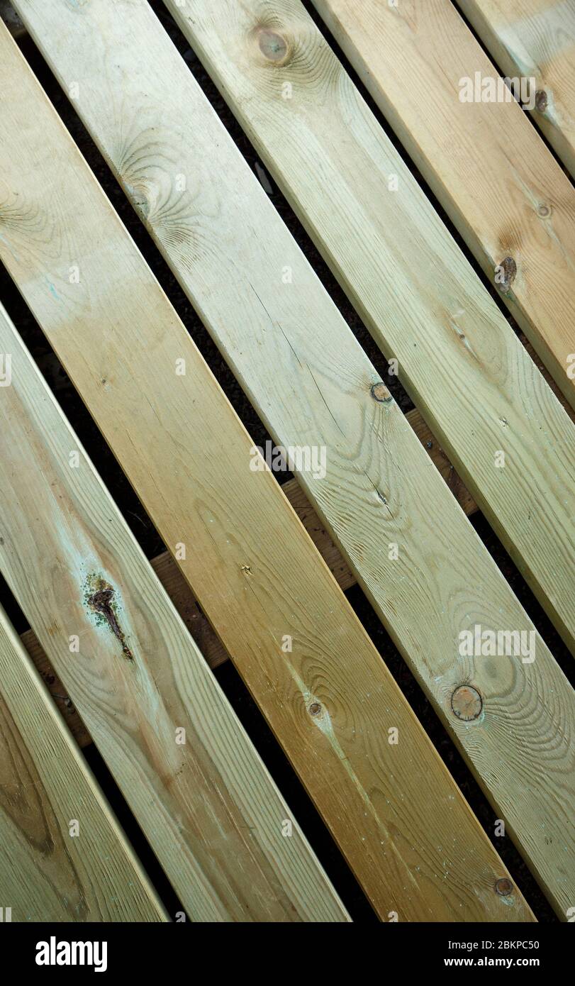 Flooring grate made of green pressure treated  ( chemical pressure impregnated ) wooden boards Stock Photo